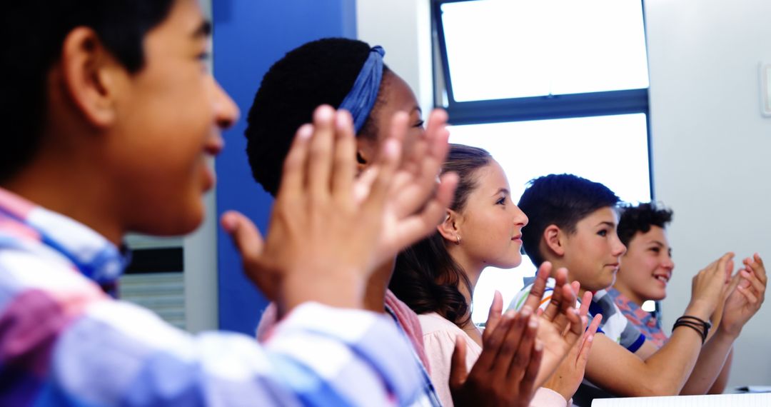 Diverse Group of Students Clapping in Classroom - Free Images, Stock Photos and Pictures on Pikwizard.com