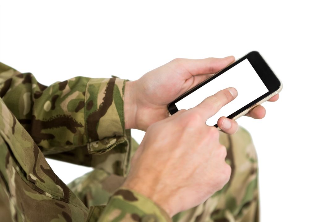 Soldier Using Smartphone in Camouflage Uniform - Free Images, Stock Photos and Pictures on Pikwizard.com