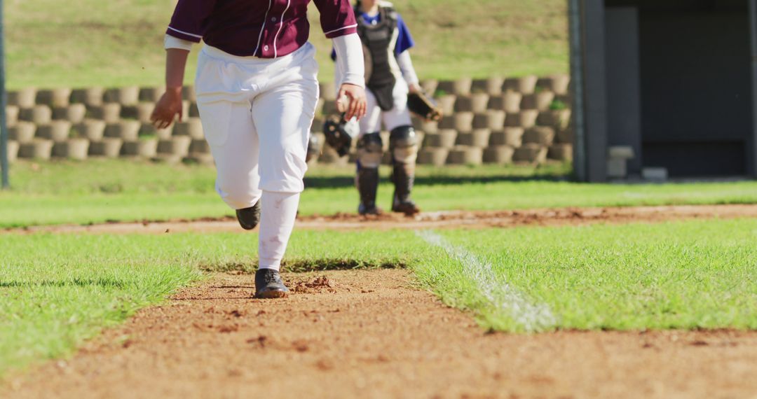 Youth Baseball Player Running Bases on Sunny Day - Free Images, Stock Photos and Pictures on Pikwizard.com