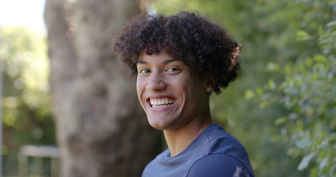 Smiling Man in Park to Value Outdoor Happiness and Well-Being