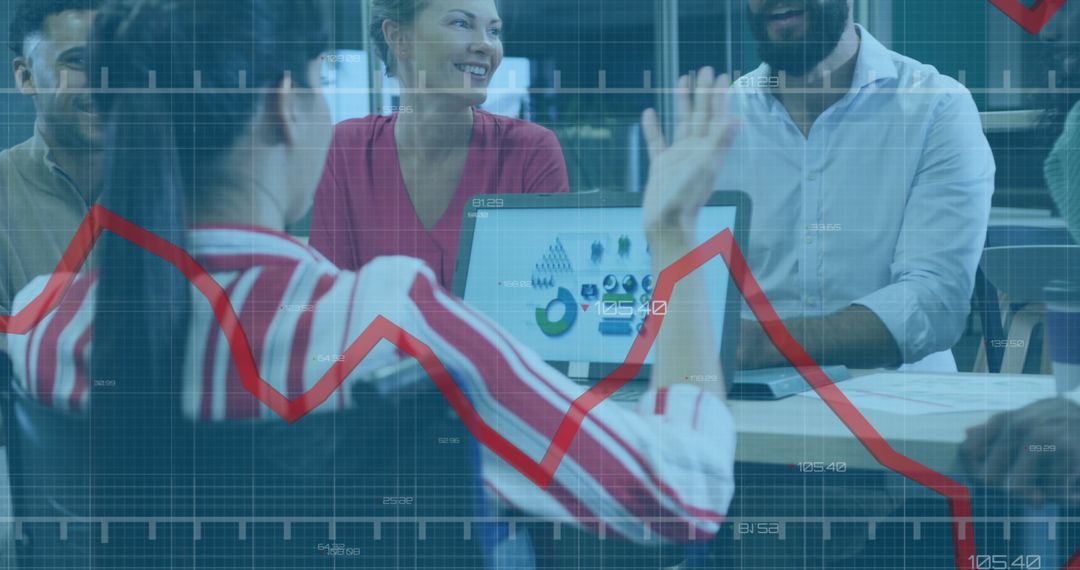 Diverse Team Analyzing Data Trends in Modern Office