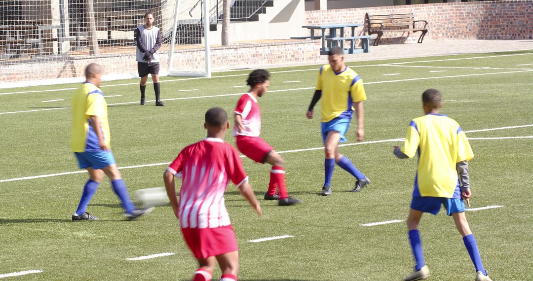 Intense Soccer Match with Players Competing on Field