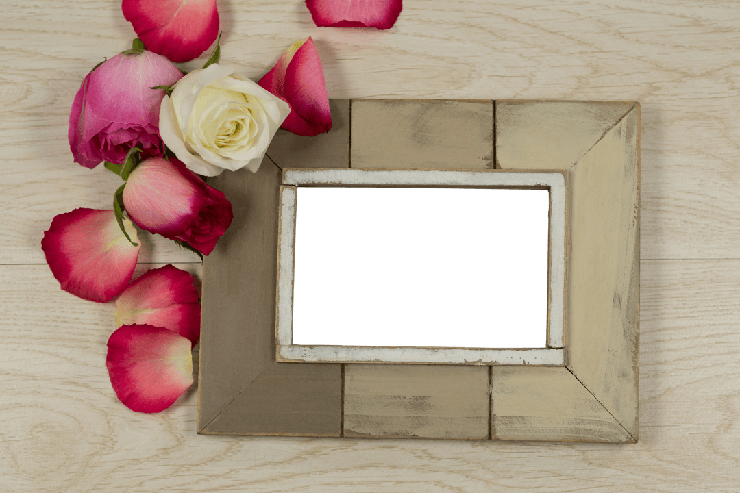 Wooden Frame with Roses Beside on Bright Surface Adding Transparent Elegance
