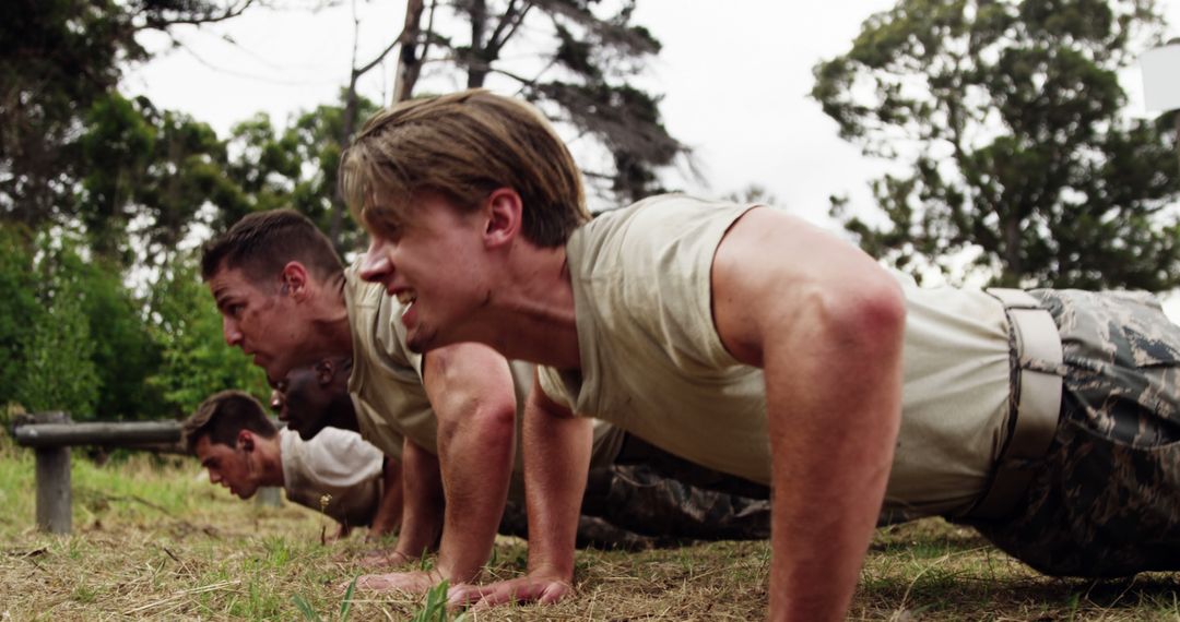 Dedicated Soldiers Performing Push-Ups in Outdoor Training - Free Images, Stock Photos and Pictures on Pikwizard.com