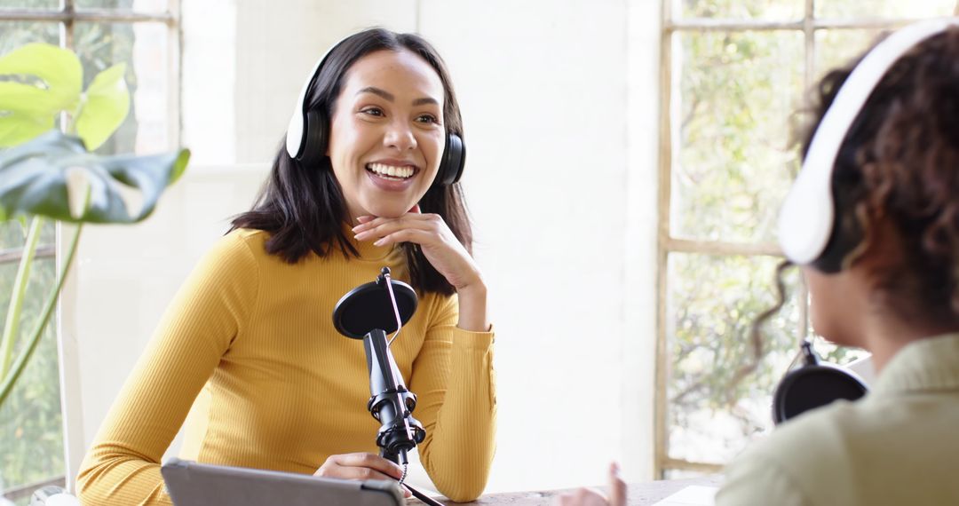 Enthusiastic Podcasters Recording Exciting Show at Home