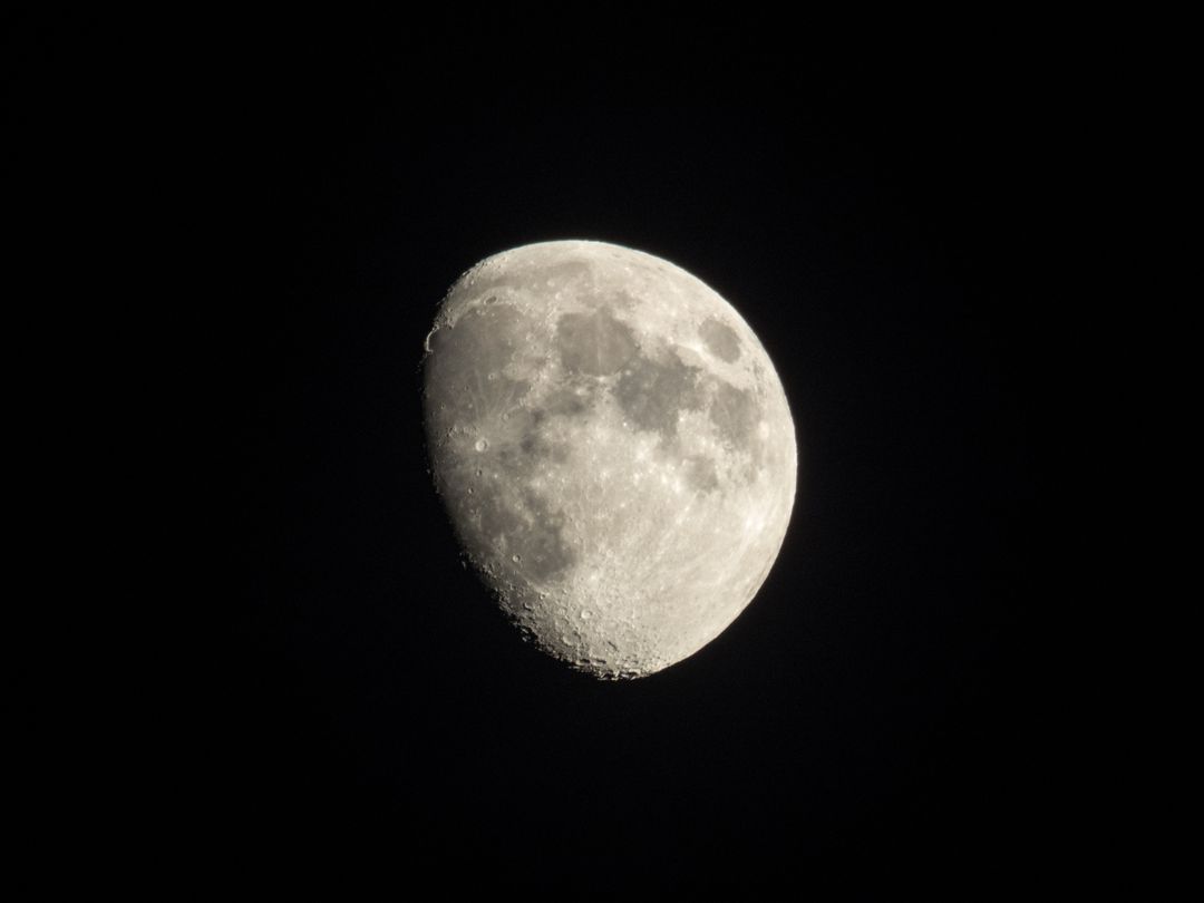 Detailed Waxing Gibbous Moon Against Black Sky