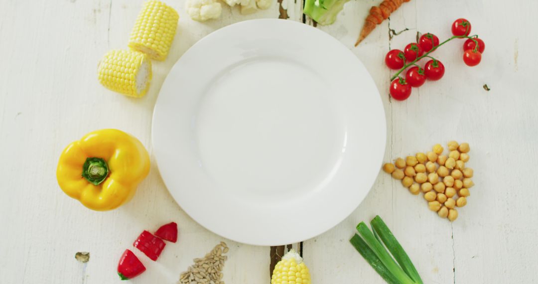 Healthy Vegetables and Empty Plate on White Wooden Table - Free Images, Stock Photos and Pictures on Pikwizard.com