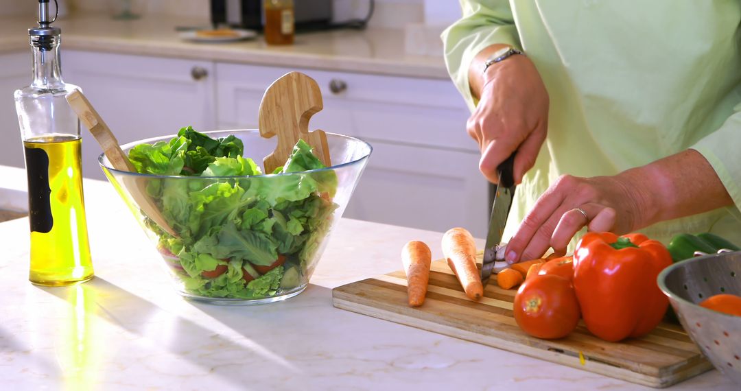 Preparing Fresh Salad in Modern Kitchen - Free Images, Stock Photos and Pictures on Pikwizard.com