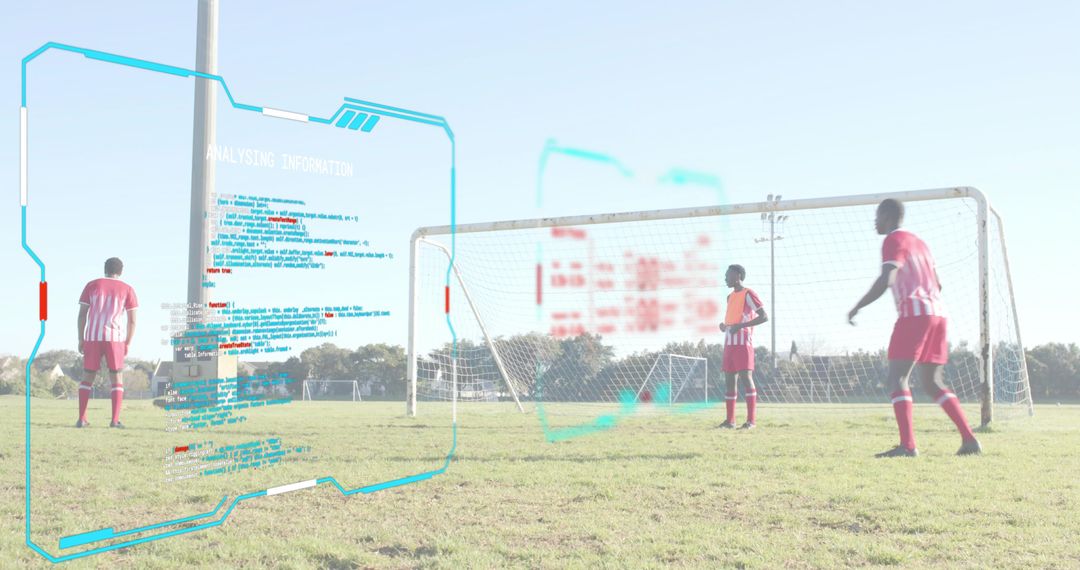 Young soccer defenders analyzing tactics with augmented reality overlay on training field