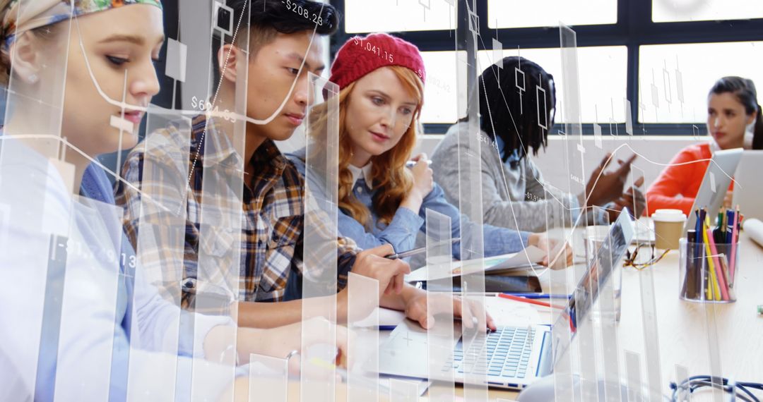 Diverse Team Analyzing Financial Data with Technology in Modern Office