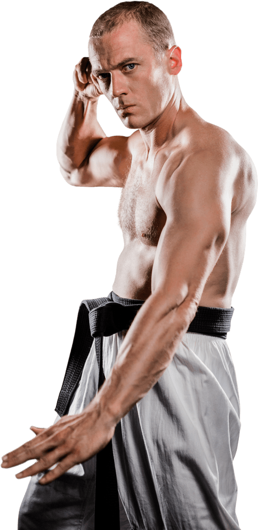 Strong Karate Fighter in Dynamic Stance on Transparent Background