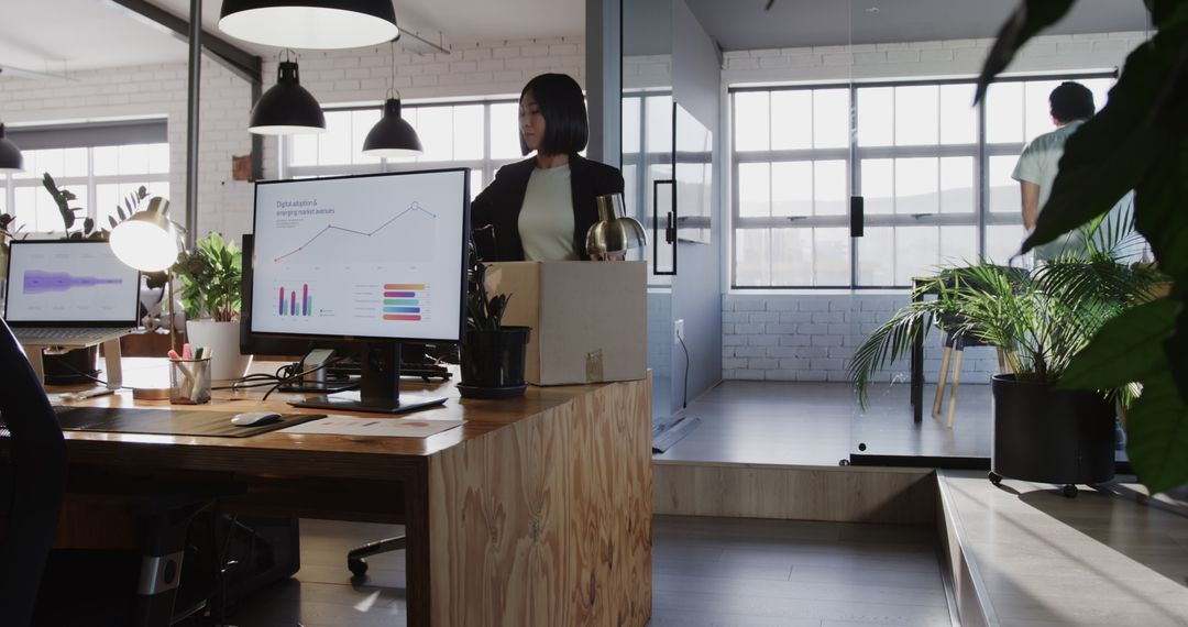 Businesswoman Analyzing Data in Modern Workspace