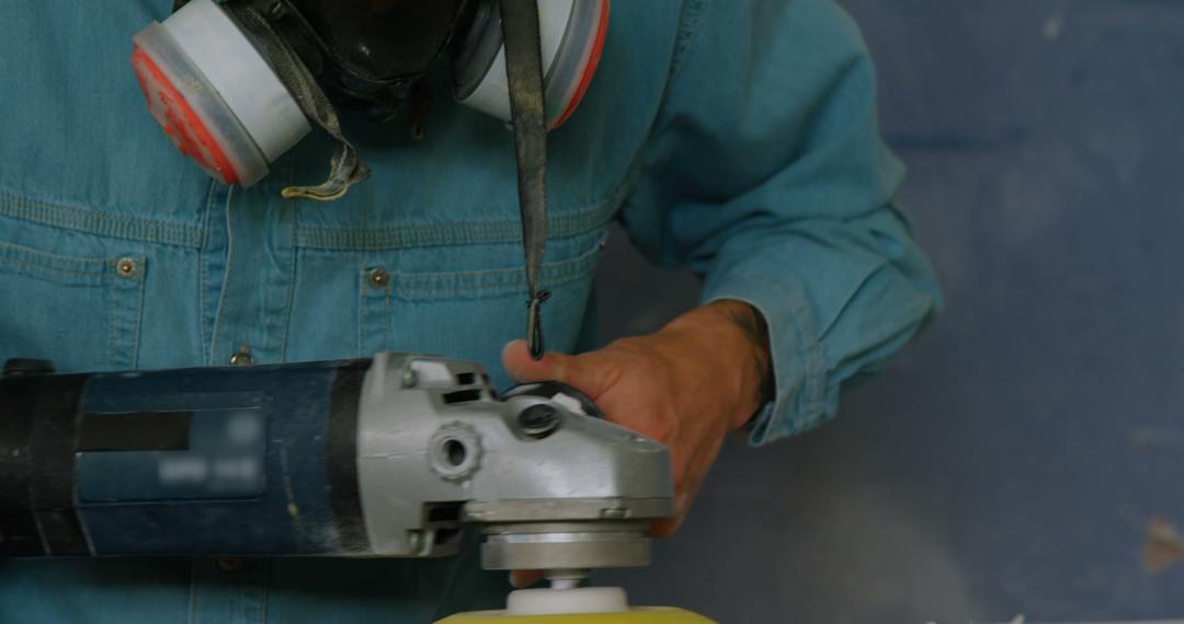 Surfboard Maker Buffing with Power Tool - Free Images, Stock Photos and Pictures on Pikwizard.com