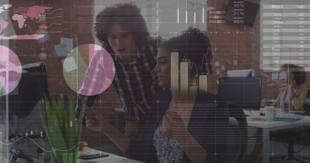 Diverse Team Analyzing Stock Data on Computer Screens in Modern Office