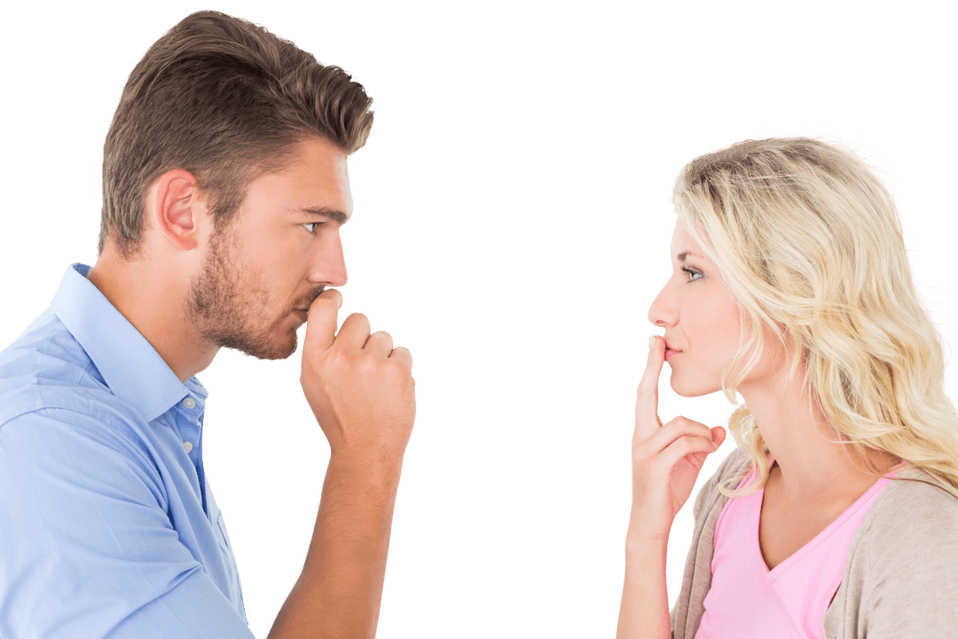 Transparent Couple Gesturing Silence With Finger on Lips