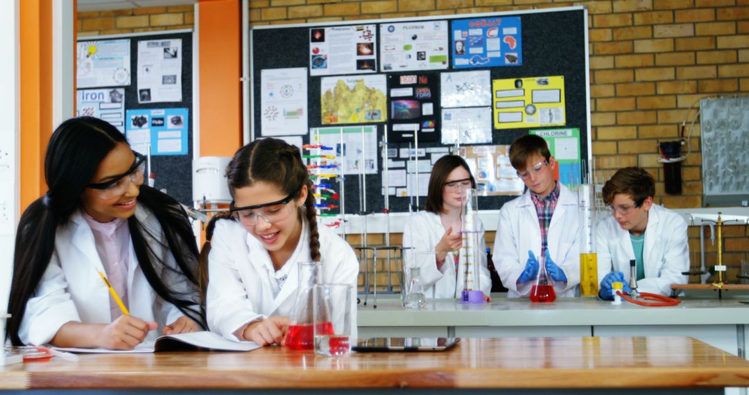 Students Engaged in School Science Experiment in Laboratory