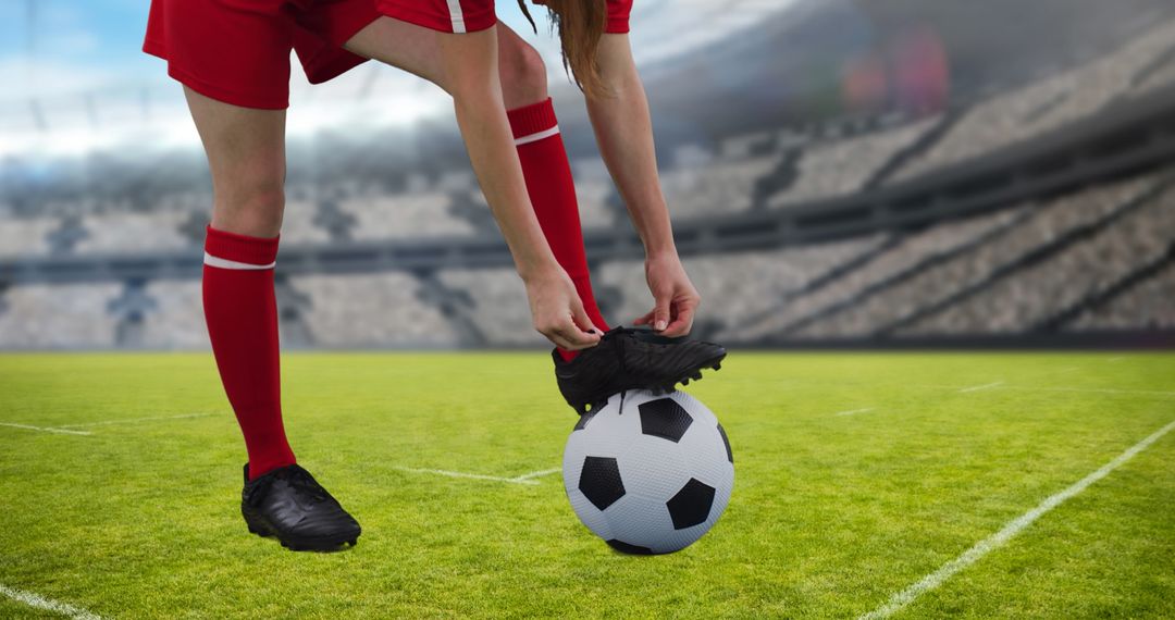 Female Soccer Player Preparing on Stadium Field
