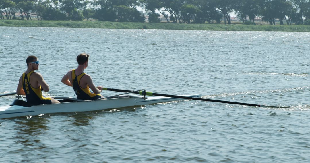 Two Male Rowers in a Double Scull Training on a Lake - Free Images, Stock Photos and Pictures on Pikwizard.com