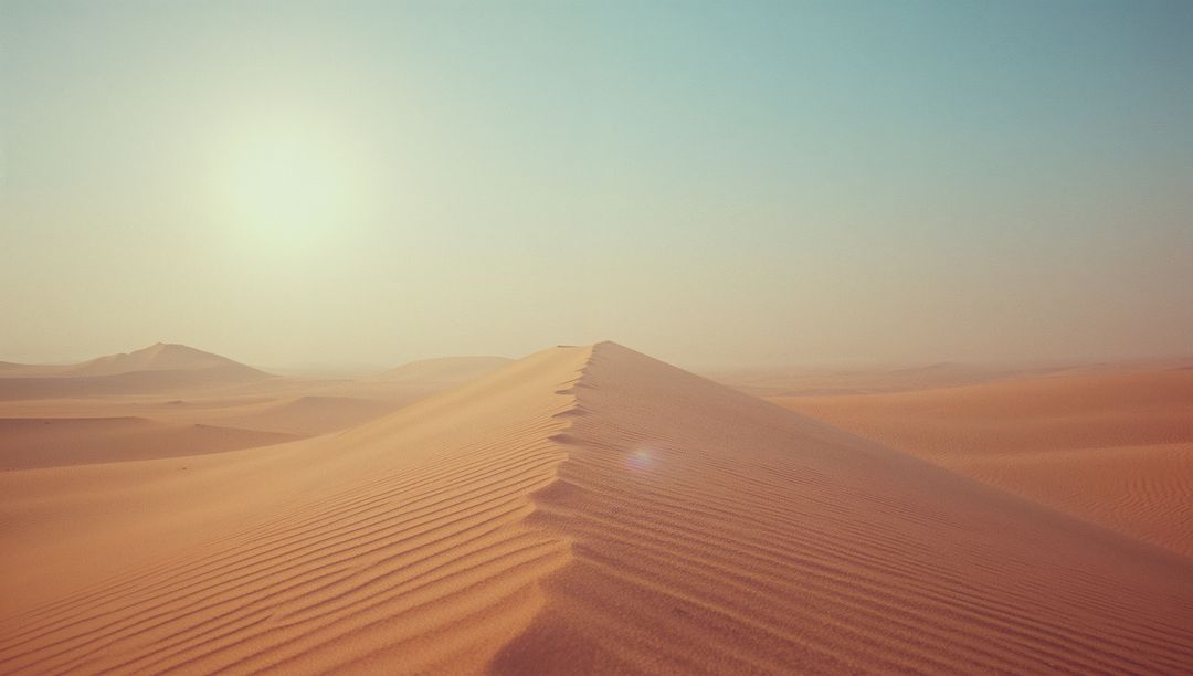 Vast Desert Sands Under Bright Sun with Rippled Patterns