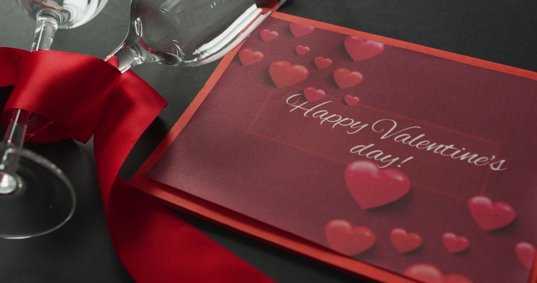 Valentine's Day Greeting Card with Wine Glasses and Red Ribbon