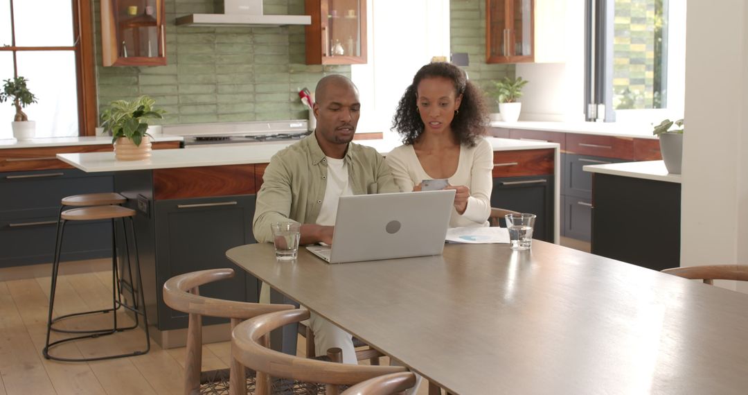 Couple Collaborating on Technology at Home Pool Ideas