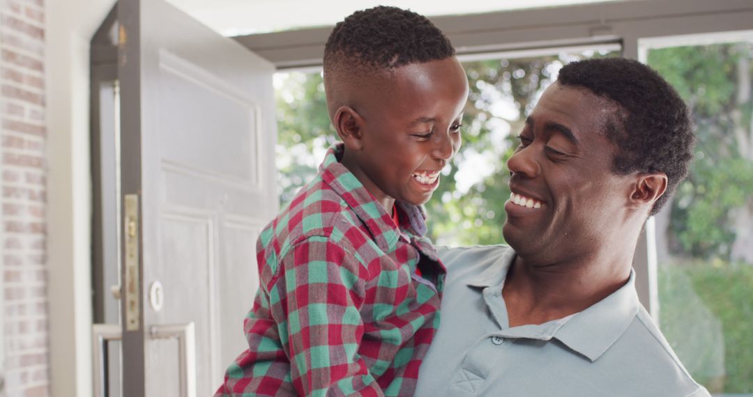 Portrait of happy african american father with son - Free Images, Stock Photos and Pictures on Pikwizard.com