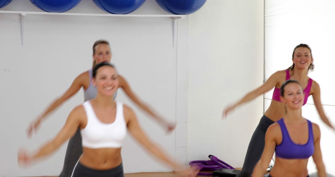 Group of Women Participating in Fitness Class with Exercise Balls - Free Images, Stock Photos and Pictures on Pikwizard.com