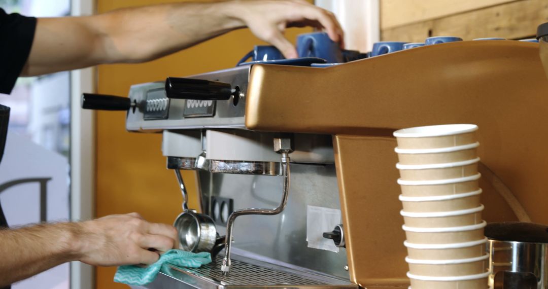 Barista Making Coffee Using Espresso Machine in Coffee Shop - Free Images, Stock Photos and Pictures on Pikwizard.com