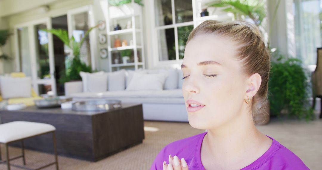 Young Woman Meditating Peacefully in Modern Home - Free Images, Stock Photos and Pictures on Pikwizard.com