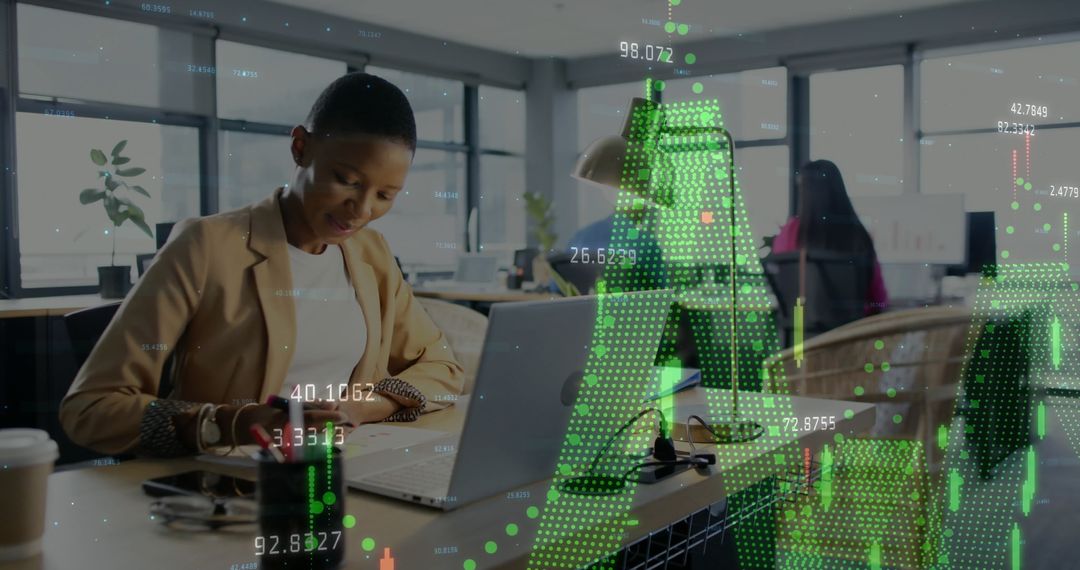 Diverse Businesswomen Analyzing Financial Data on Laptops