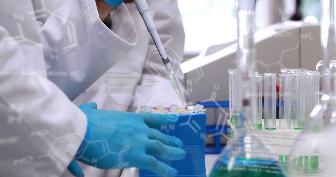 Scientist Using Pipette in Modern Laboratory Science Research