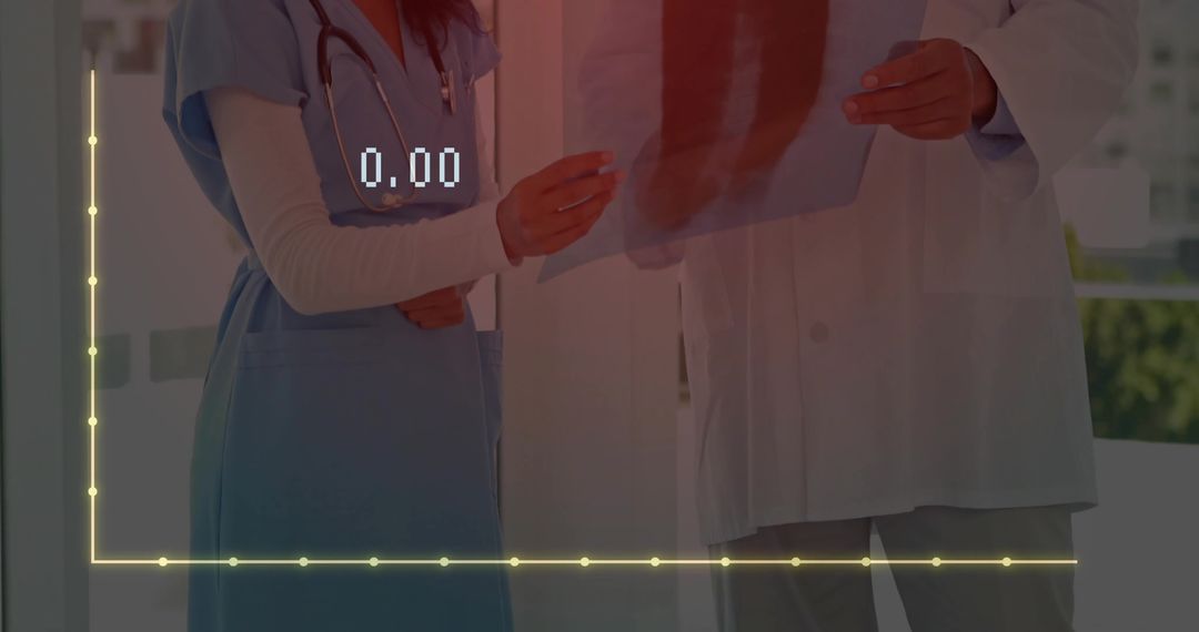 Medical Professionals Examining X-ray with Graph Overlay Analysis
