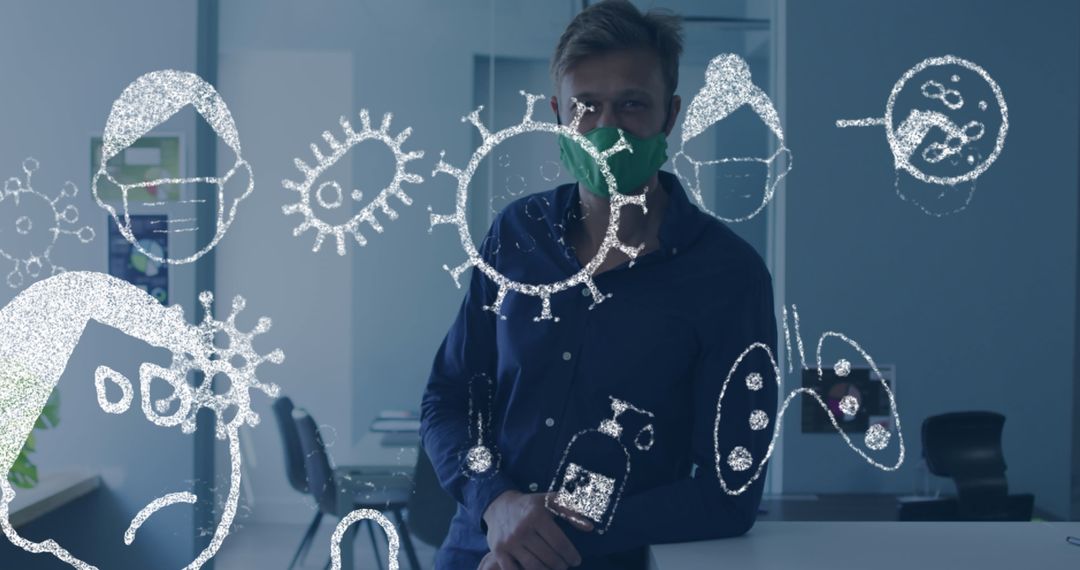 Man Wearing Face Mask in Office with COVID-19 Icons Overlay