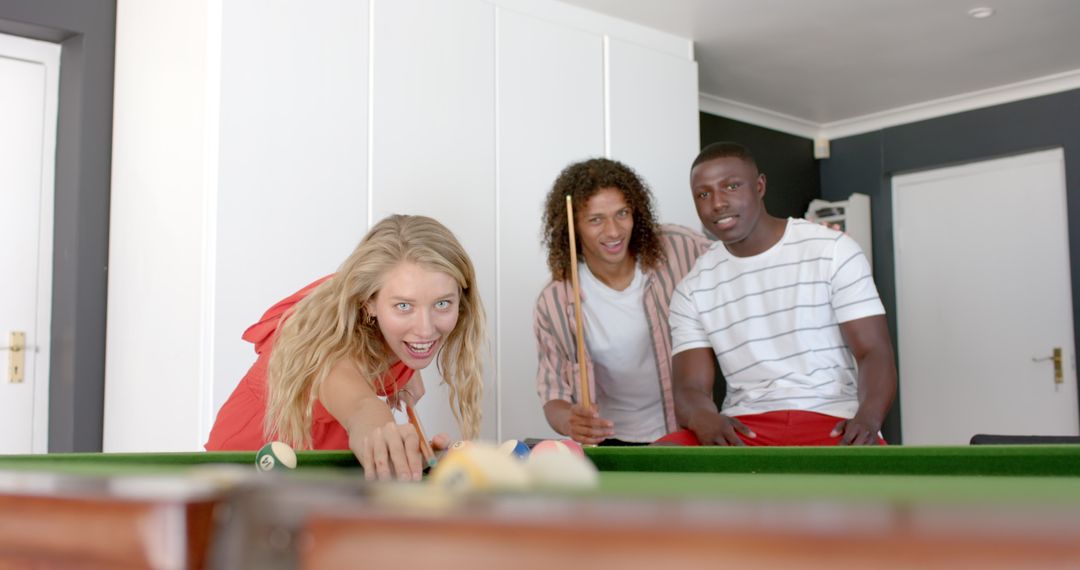 Young Group Enjoying Pool Game Leisure Indoors
