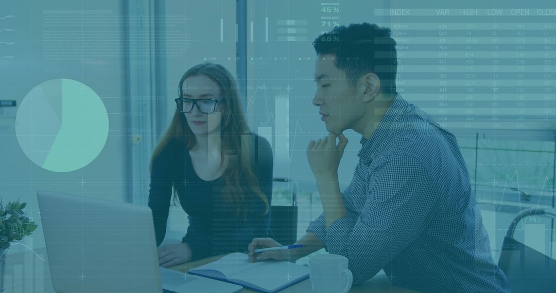 Diverse Team Analyzing Data Visualizations on Laptop