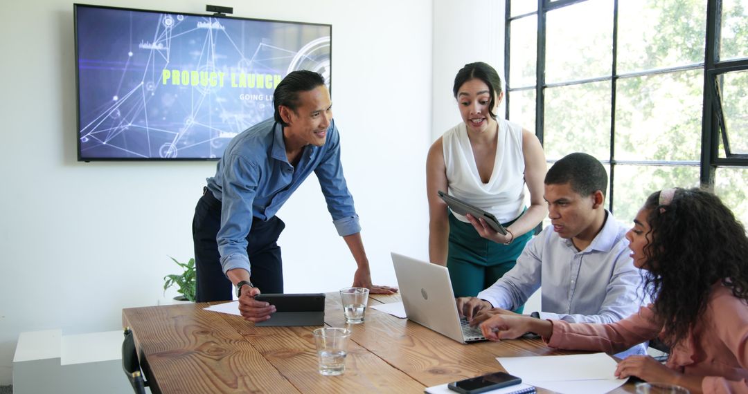 Team Collaboration with Laptop and Presentation Screen