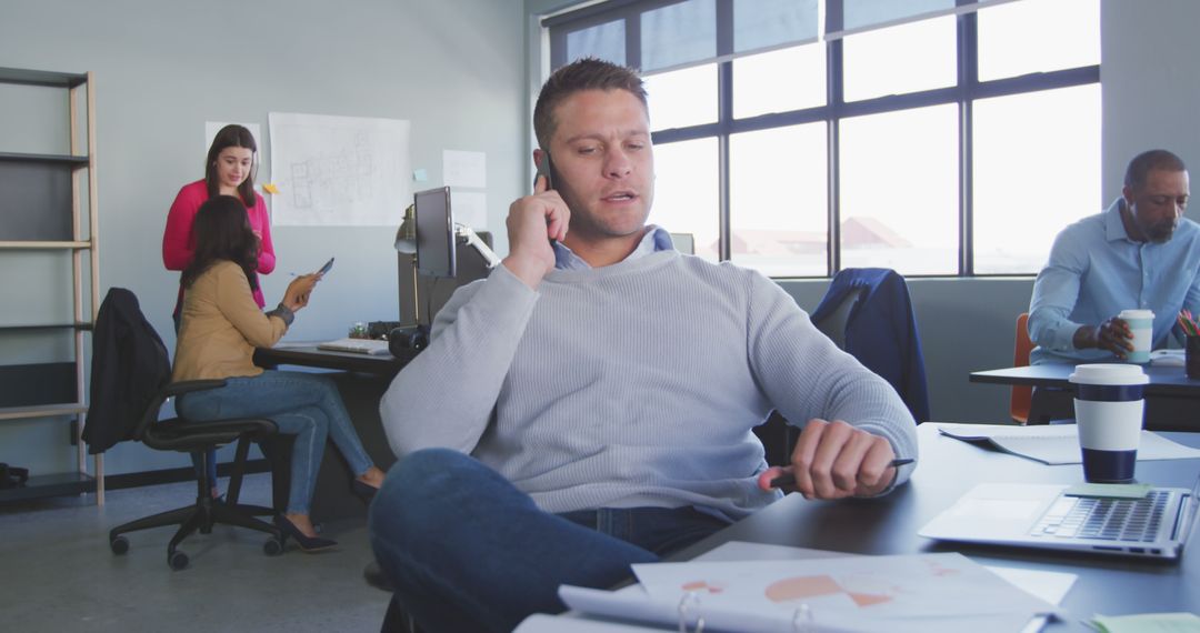 Diverse Office Environment with Professionals Working