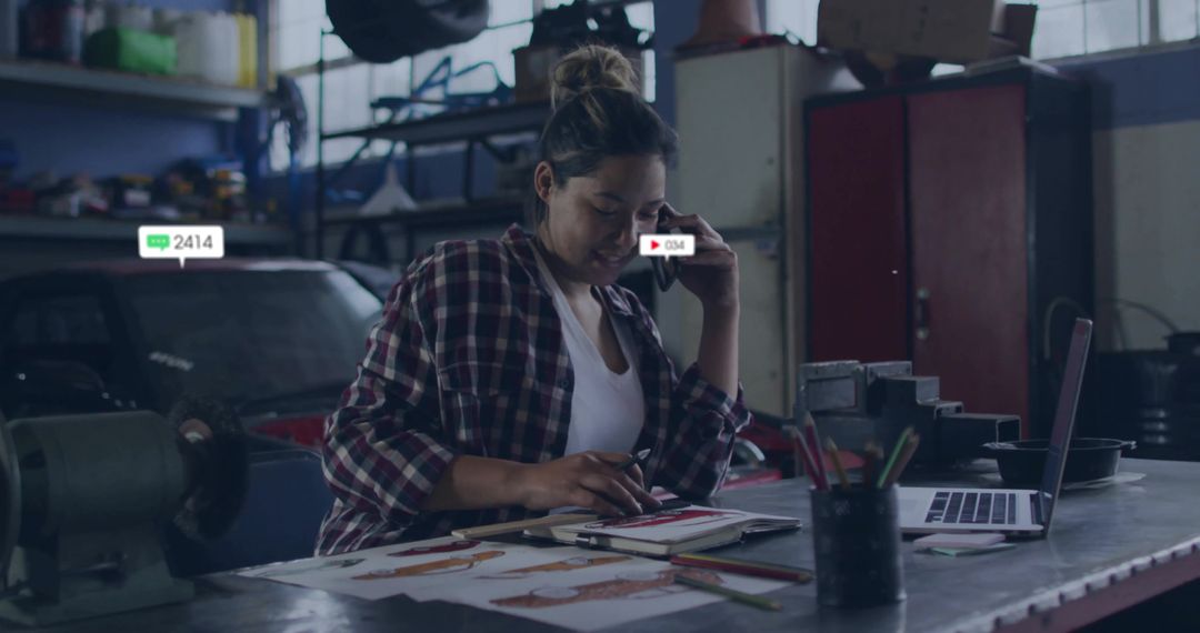Female Designer Sketching Shoes in Garage Workshop