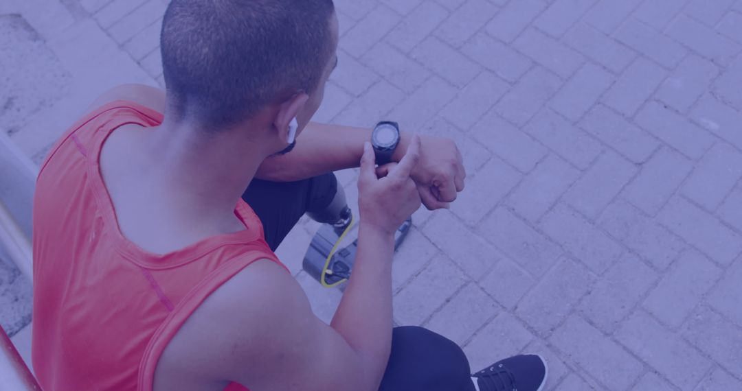 Athletic Runner Wearing Smartwatch Checking Performance Metrics Listening Music - Free Images, Stock Photos and Pictures on Pikwizard.com