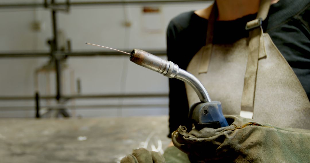 Welder Handling Torch in Workshop - Free Images, Stock Photos and Pictures on Pikwizard.com