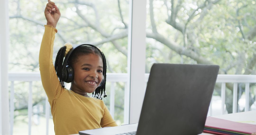 Joyful African American Girl Learning Online at Home - Free Images, Stock Photos and Pictures on Pikwizard.com