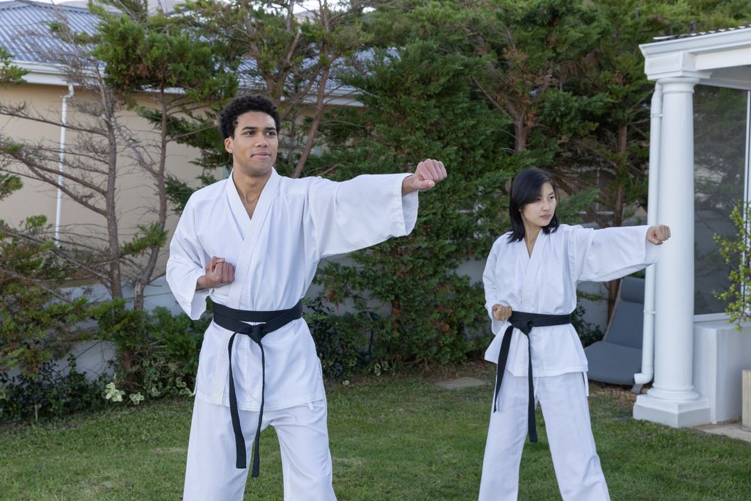 Martial Arts Training Session in Backyard with Karate Practitioners
