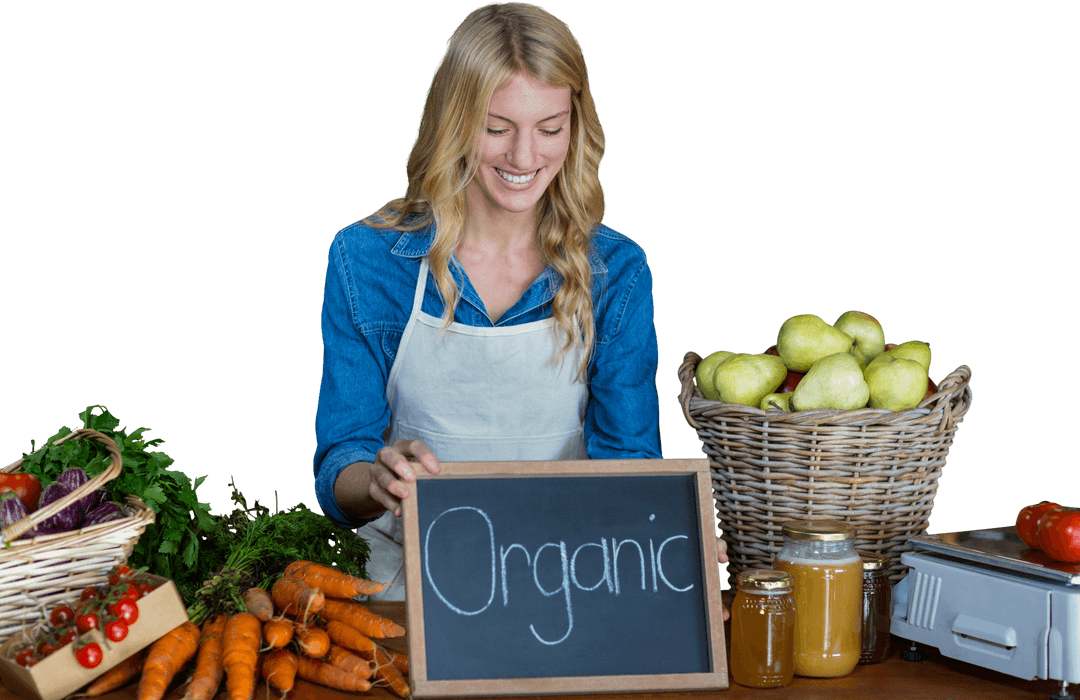 Smiling Woman with Fresh Organic Produce Holding Chalkboard
