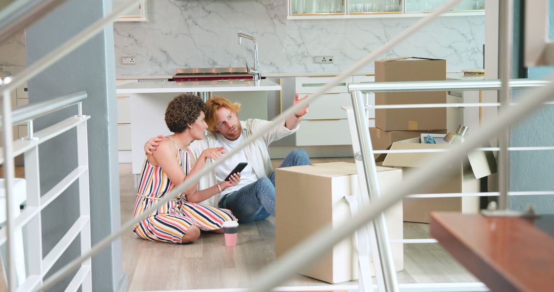 Interracial Couple Enjoying New Home During Move-in