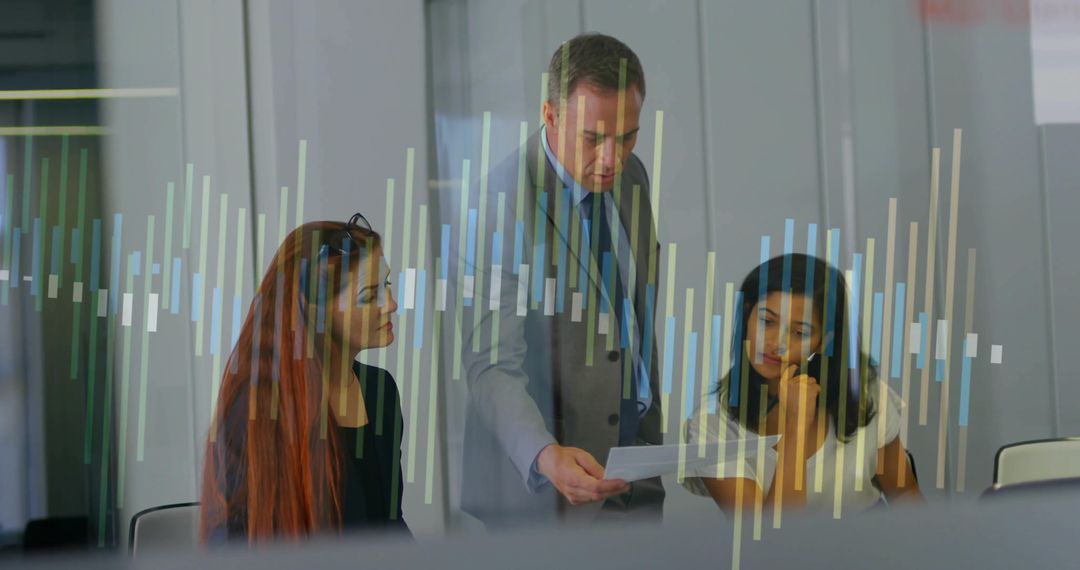 Professional Team Analyzing Data in Modern Conference Room