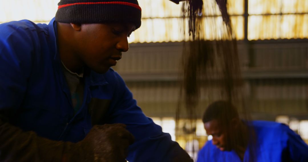 African American Workers Processing Soil in Factory - Free Images, Stock Photos and Pictures on Pikwizard.com