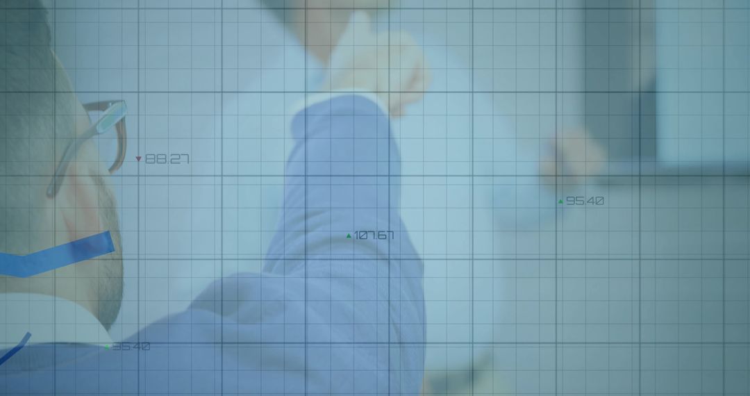 Business Professional Analyzing Data on Transparent Board