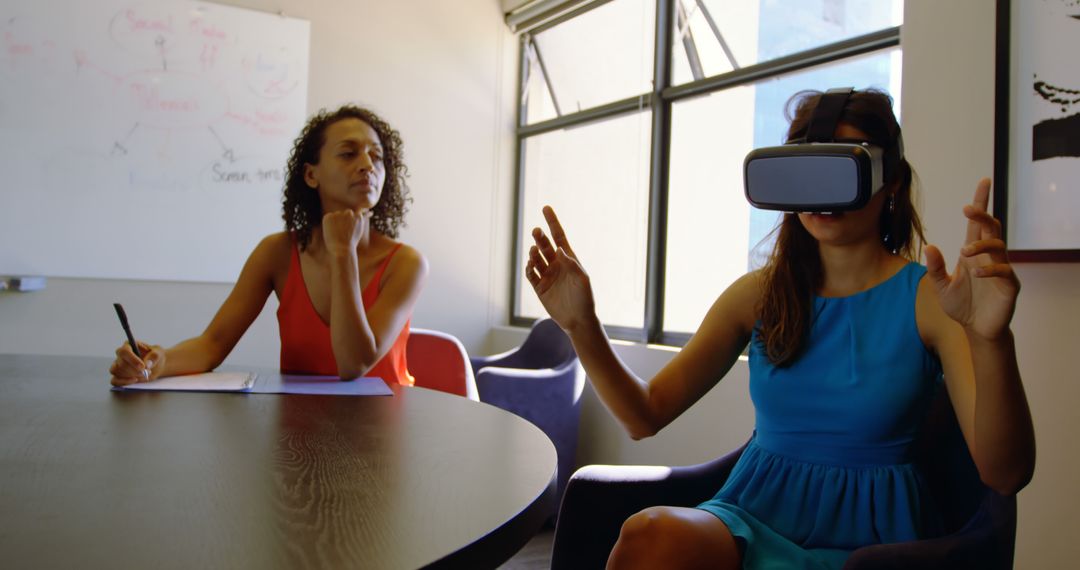 Woman Using Virtual Reality Headset in Office Meeting - Free Images, Stock Photos and Pictures on Pikwizard.com