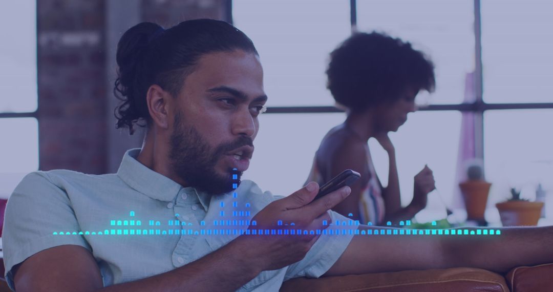 Biracial Man Interacting with Voice Assistant on Smartphone