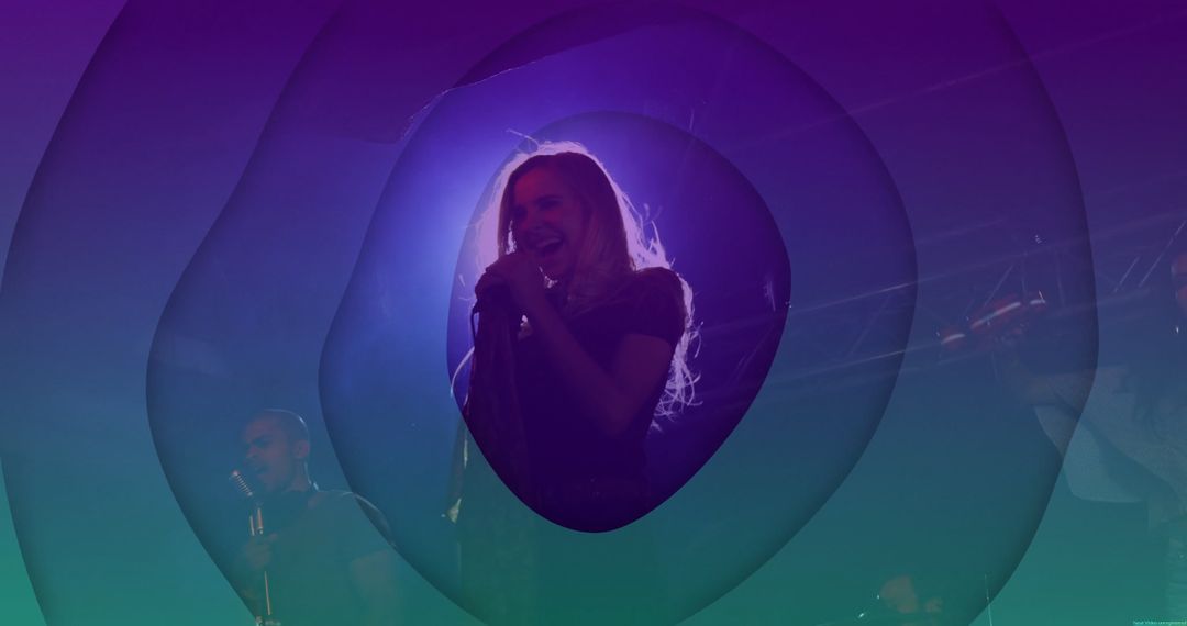 Female Vocalist Singing on Stage in Vibrant Lighting